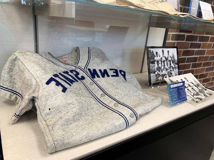 Display of student athletics items from Penn State Mont Alto archives 